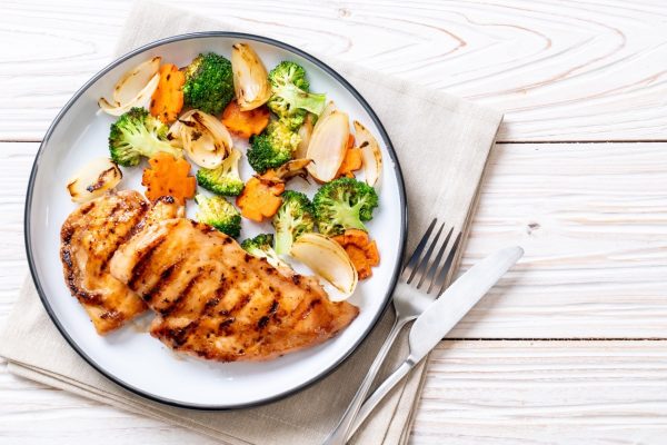griled chicken breast steak with vegetable (broccoli,carrot,onions)